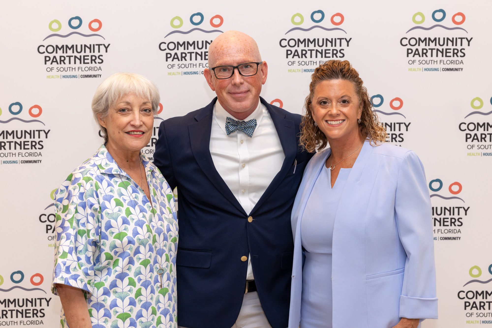 Former CPSFL Board Chair Charlotte Pelton, CPSFL Board Chair Brian Lynott and CPSFL CEO Kelly Powell