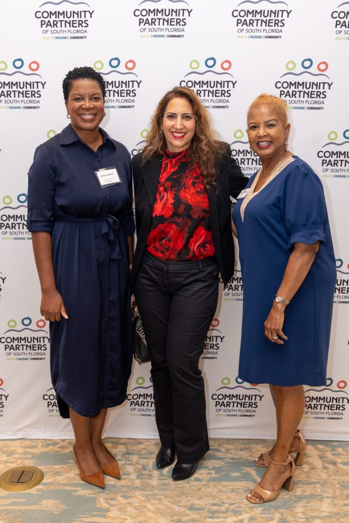 Shekeria Brown and Debbie Rahamim of JPMorganChase, Keely Gideon-Taylor, The Palm Beach Post