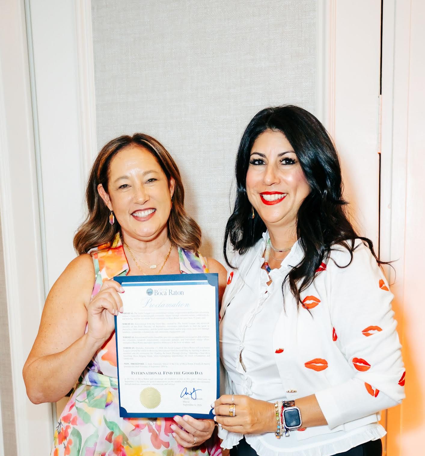 Junior League President Melody Cobbe receiving a proclamation from City Council member Yvette Drucker
