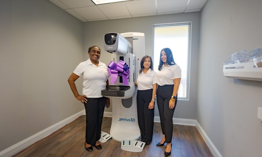 Promise Fund Navigators with Mammogram Machine